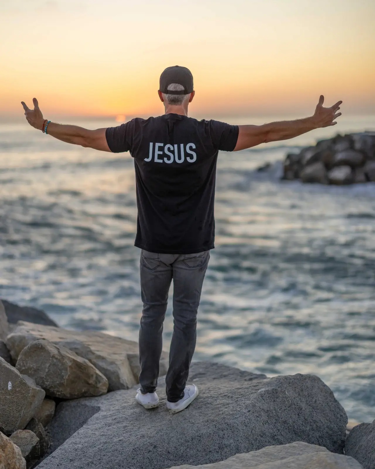 Thumbnail — Men's black “The Answer Is...” Christian shirt back with “Jesus” print
