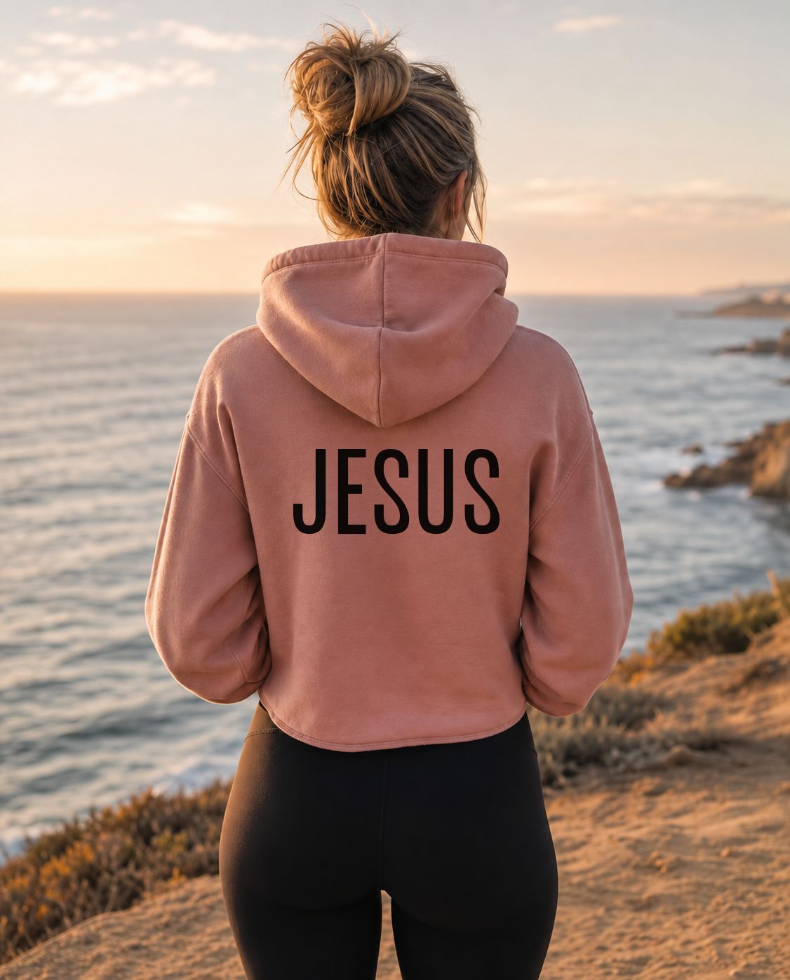 Thumbnail — Women's desert pink “The Answer Is...” Christian hoodie back with “Jesus” print