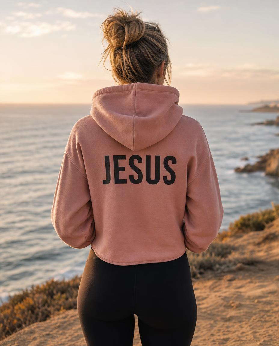Thumbnail — Women's desert pink “The Answer Is...” Christian hoodie back with “Jesus” print